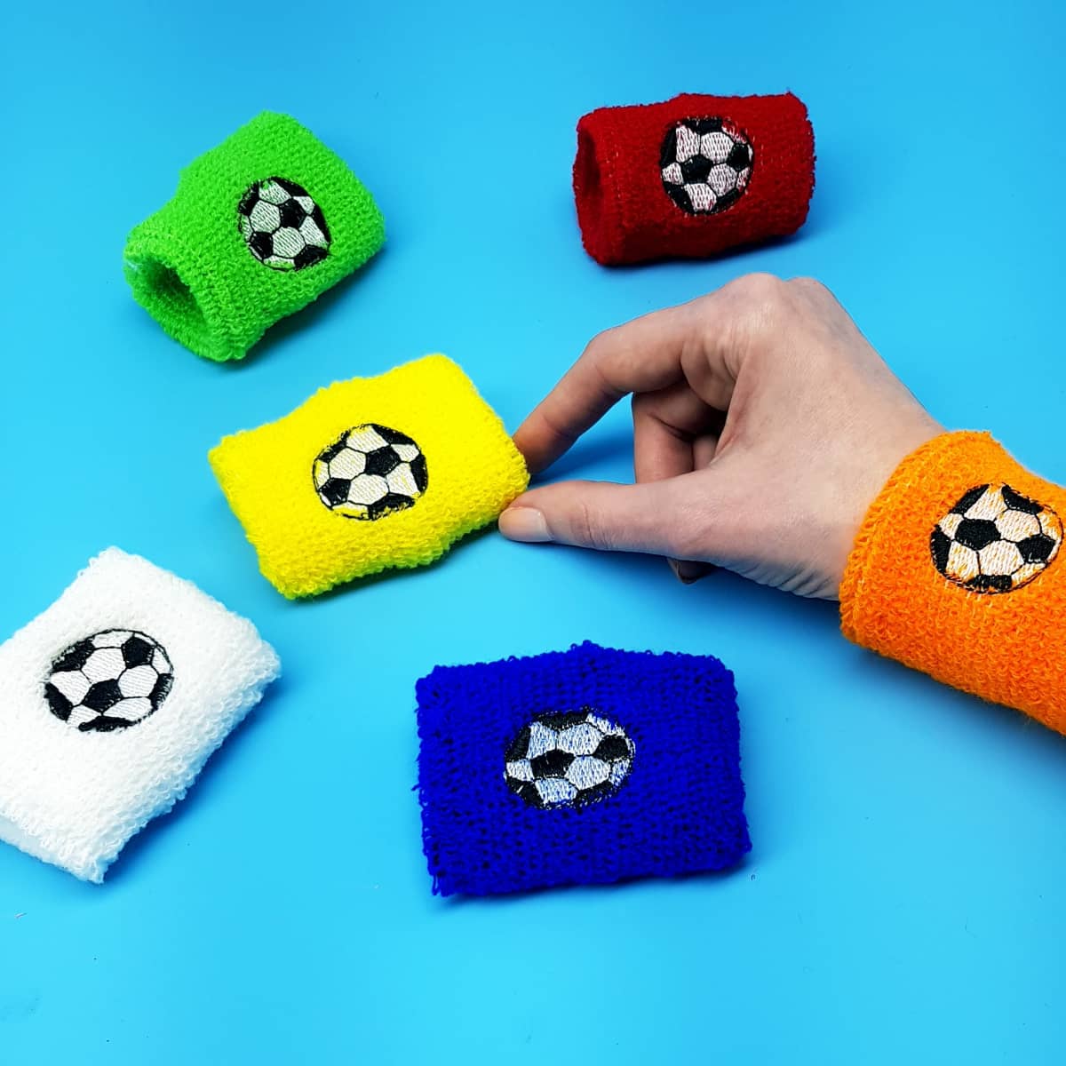 Schweißbänder Fußball Textil-Armbänder mit Fußball-Motiv in bunten Farben