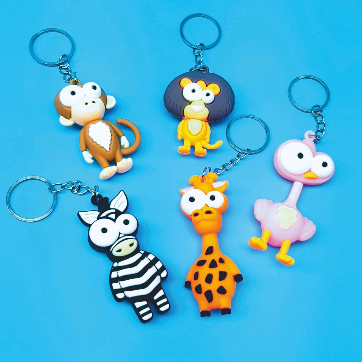 Schlüsselanhänger Glubschi-Tiere Knautsch-Anhänger mit lustigen Tieren Safari- und Wildlife Affe Giraffe Löwe Flamingo Zebra Warzenschwein